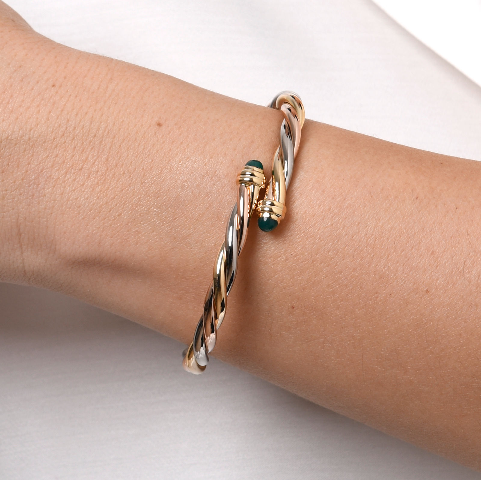 Cartier Trinity Vintage Armspange mit Smaragden  in 750er / 18 Kt. GG/WG/RG