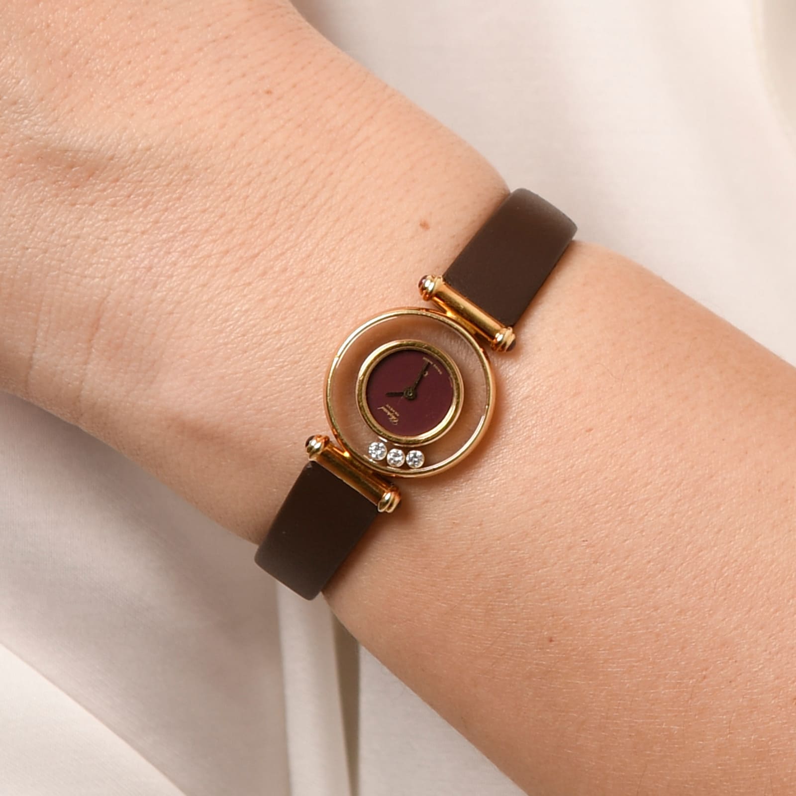 Chopard Happy Diamonds Armbanduhr mit Rubin Cabochon in 18 Kt. GG Ref: 20/4780